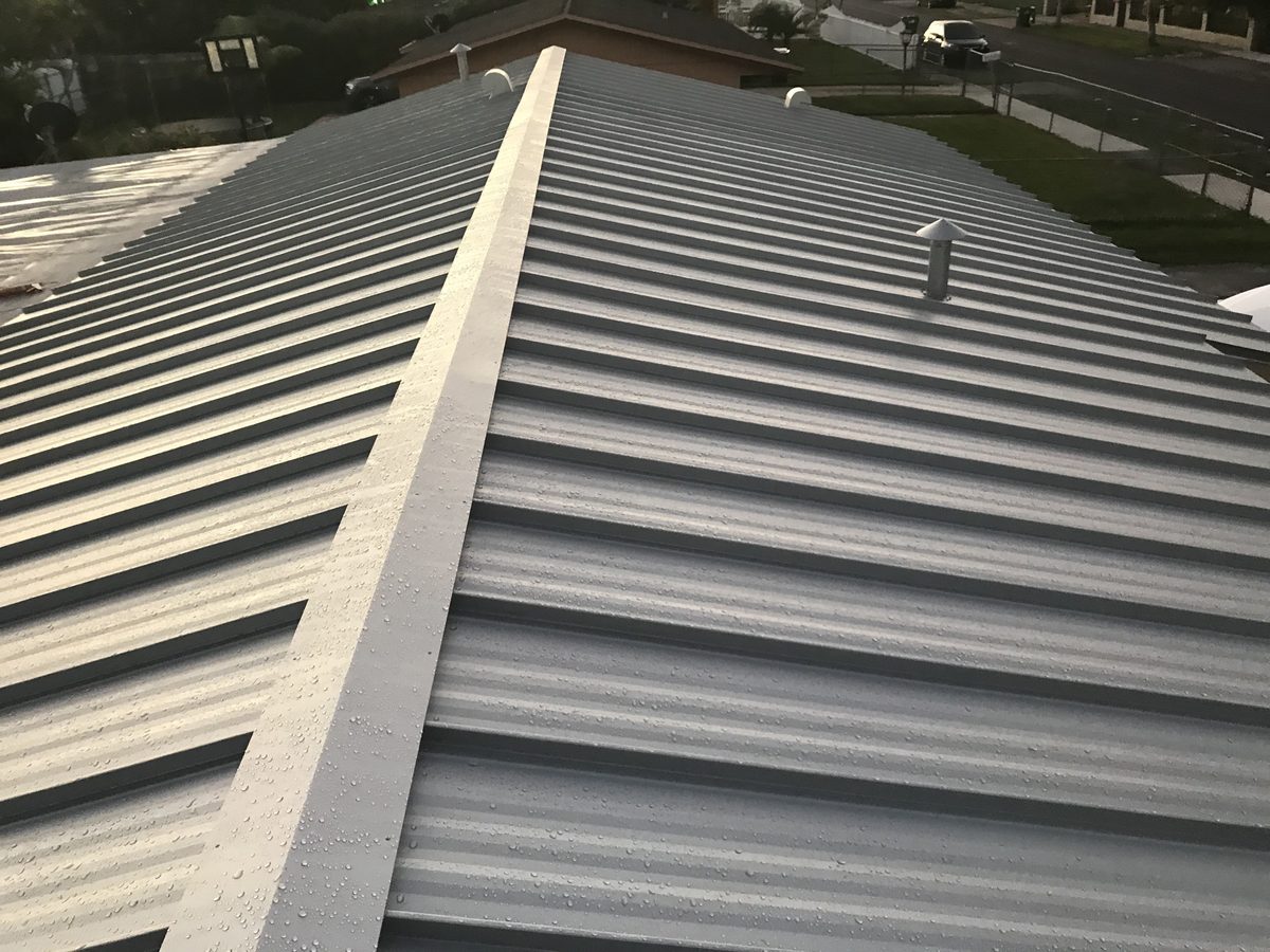 An overhead view of a newly installed grey metal roof.